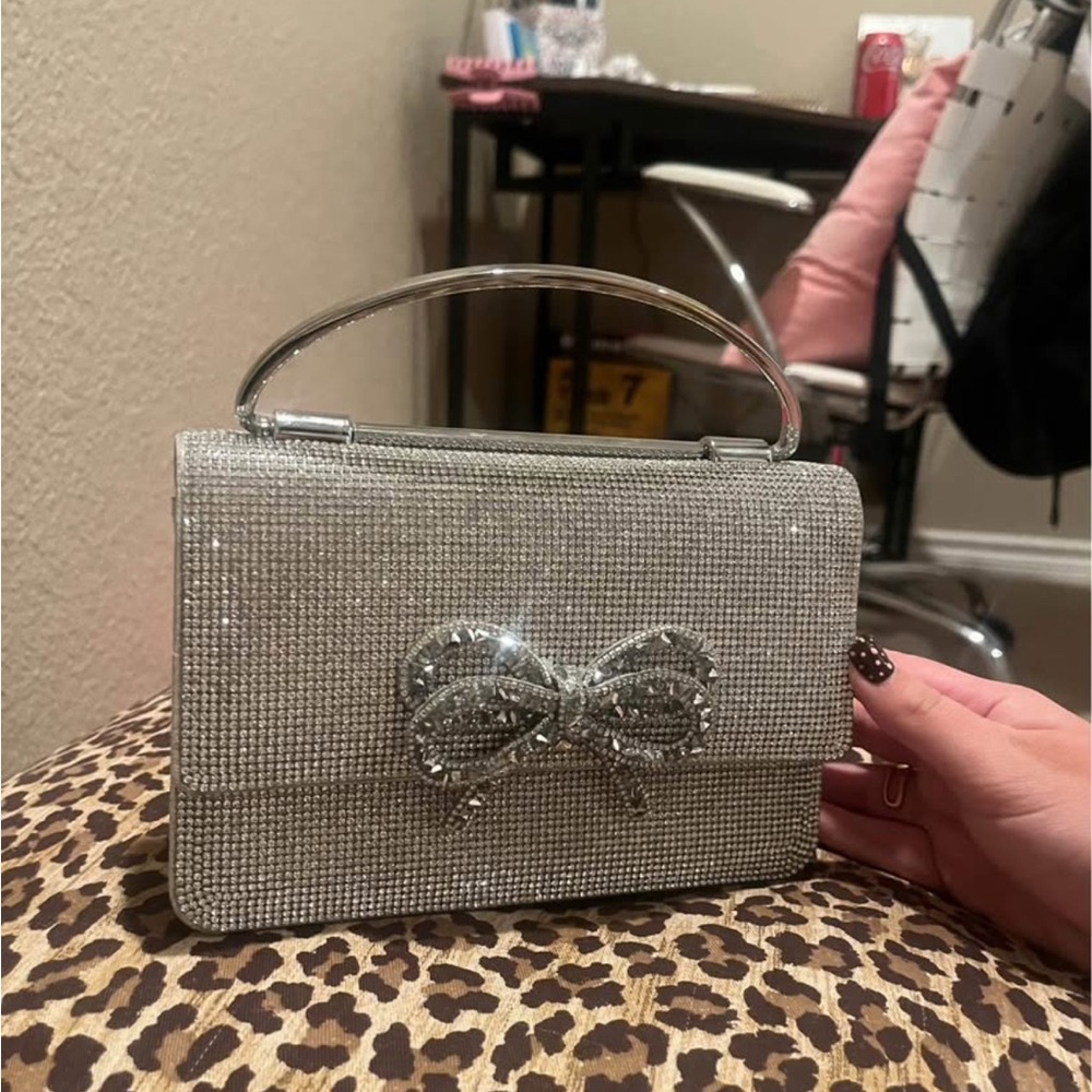 ANTONIO MELANI Silver Clutch with Bow Detail